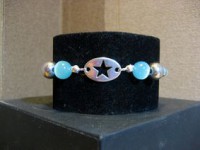 Pulsera elástica con bolas de ojo de gato y pieza de metal estrella de zamac 