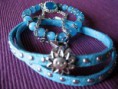 Pulseras doble de antelina con faluchas y sol de metal zamac y pulsera con ojo de gato azul y pulsera de cadena y cristal entre pieza de swarovski