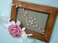 Tocado de comunión, lazo de raso y flor central de tela y tocado engarzado con perlas y piedras swarovski